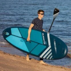Gladiator Pro 10'6 X 32" Paddleboard 2023 -Sup Inflatables gladiator 10 6 on beach male model 2