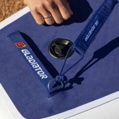 Gladiator Elite S 12'6 X 30" Paddleboard 2023 -Sup Inflatables gladiator elite putting leash on board 3