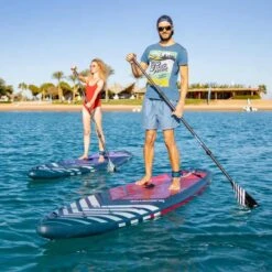 Gladiator Pro 11'4 X 32" Paddleboard 2023 -Sup Inflatables gladiator 11 4 12 6 pro s man on sea with11 2 in back 1